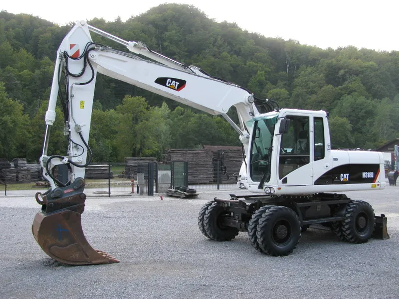 Bager točkaš Caterpillar M318D TOP stanje