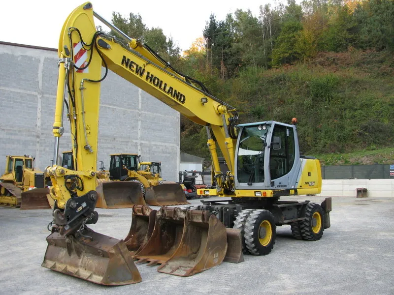 Bager točkaš New Holland WE5,6 sa 4 kašike