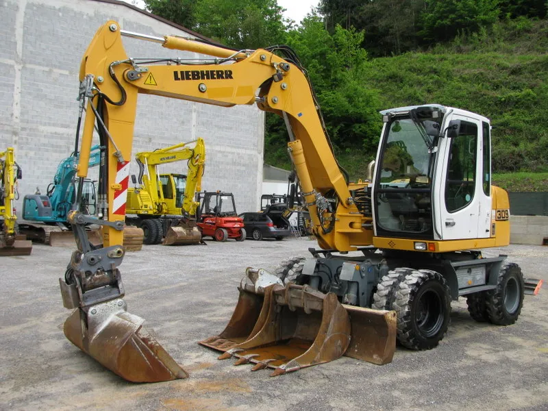 Bager točkaš Liebherr A309 Litronic POWERTILLT 3 kašike